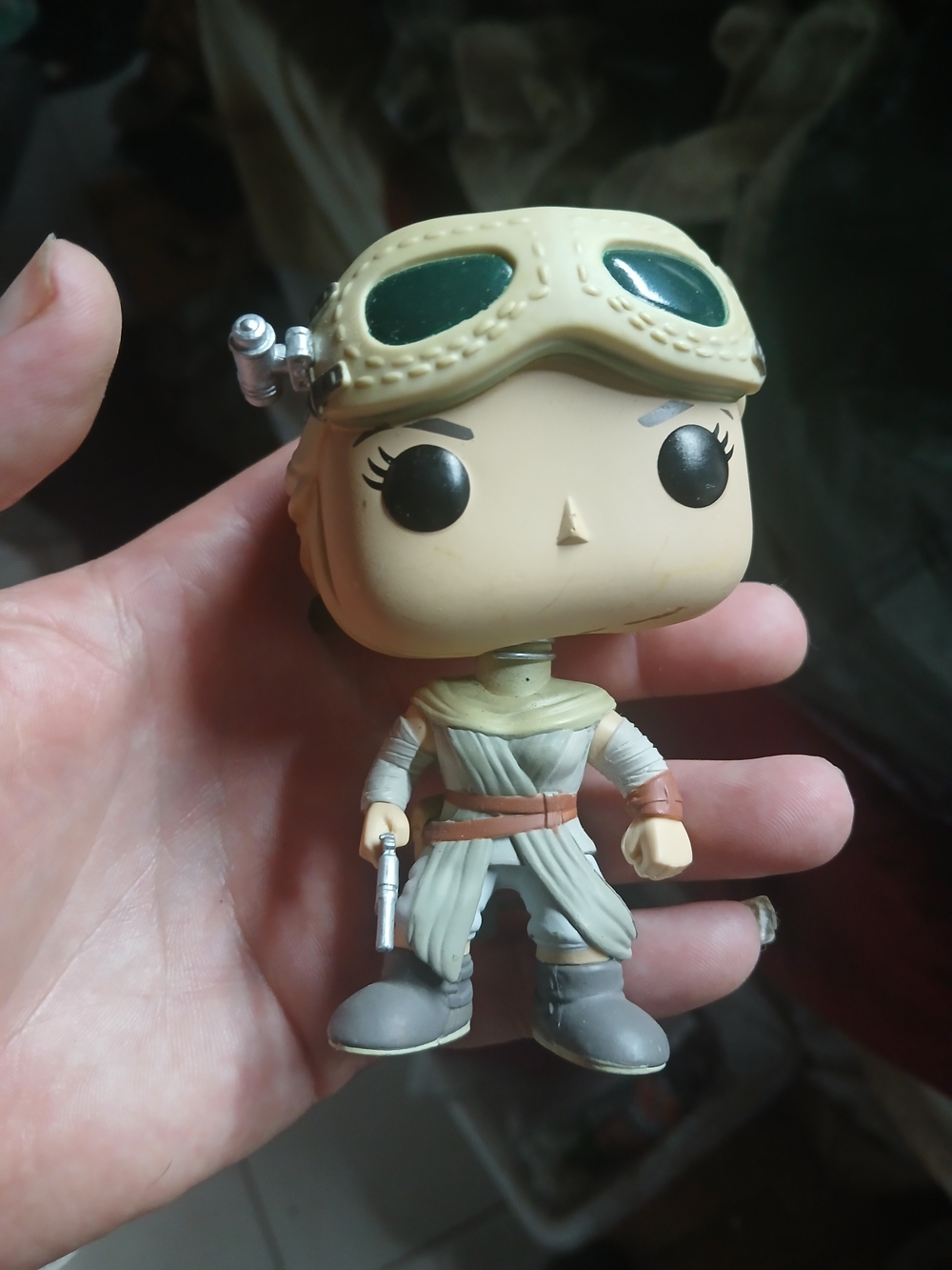 a Funko Pop! Star Wars: The Force Awakens Rey (with Goggles) #73 vinyl bobblehea